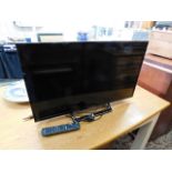 A Panasonic television with remote control