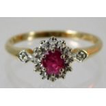 A 9ct gold ring set with ruby & moissanite 2g size
