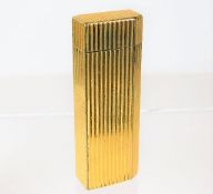 A Cartier gold plated lighter