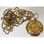 An 18ct gold pocket watch with a gold plated chain