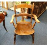 A 19thC. beech & elm armchair