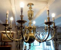 A large brass Christopher Wray light fitting