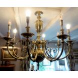 A large brass Christopher Wray light fitting