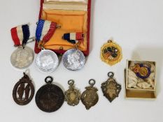 A quantity of commemorative medals & sporting meda