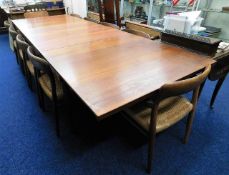 A mid 20thC. retro Finn Juhl teak extending table