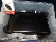 A Windows 7 Vaio laptop with printer & mouse