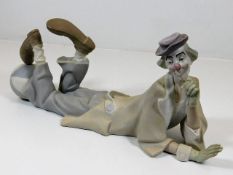 A large Lladro clown figure with bisque finish 15i