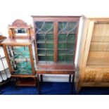 A mahogany china display cabinet
