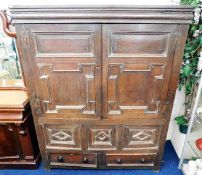 A c.1650 English oak court cupboard with drawers u