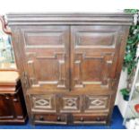 A c.1650 English oak court cupboard with drawers u