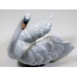 A Lladro figure of swan 3.5in high