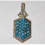 A 9ct white gold diamond & topaz pendant 3.1g