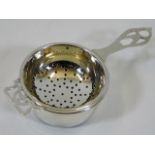 An Adie Brothers Birmingham silver tea strainer &