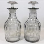 A pair of early 19thC. glass decanters