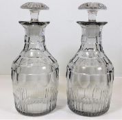 A pair of early 19thC. glass decanters