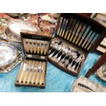 An art deco oak cased silver plated cutlery set tw
