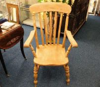 A large 19thC. slat back beech & elm armchair