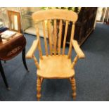 A large 19thC. slat back beech & elm armchair