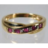 A 9ct gold ruby & diamond ring 2.4g size N