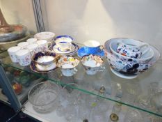 A quantity of decorative cups & saucers twinned wi