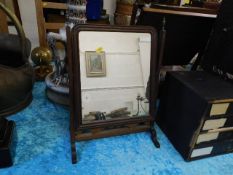 A small dressing table mirror