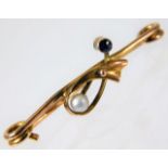 A 9ct gold brooch set with sapphire & pearl 12g