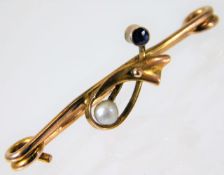 A 9ct gold brooch set with sapphire & pearl 12g