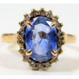 A 14ct gold ring set with cornflower blue sapphire