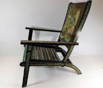 A small folding chair with chinoiserie decor