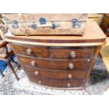 A Victorian bow front chest of drawers