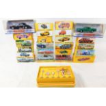 Twenty three boxed reproduced diecast cars after D