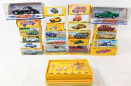 Twenty three boxed reproduced diecast cars after D