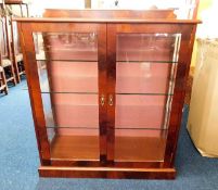 A Peter Blomfield mahogany display cabinet with th