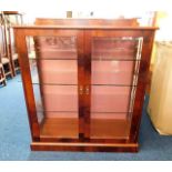 A Peter Blomfield mahogany display cabinet with th