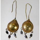 A pair of Egyptian yellow metal earrings 8.9g