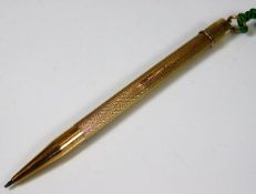 A 9ct gold self propelling pencil 10.8g inclusive