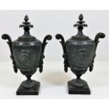 A pair of c.1900 spelter lidded urns with inverted
