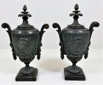 A pair of c.1900 spelter lidded urns with inverted