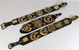 Three antique horse brass straps, one stamped "J.