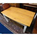 A Peter Bromfield oak topped farmhouse kitchen table with painted legs 59.25in long x 36in wide