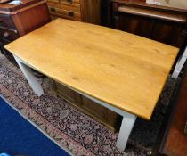 A Peter Bromfield oak topped farmhouse kitchen table with painted legs 59.25in long x 36in wide