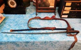 An officers dress sword with scabbard