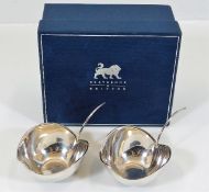 A boxed pair of Braybrook & Britten silver caviar
