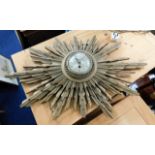 A 1920/30's sunburst clock, some faults