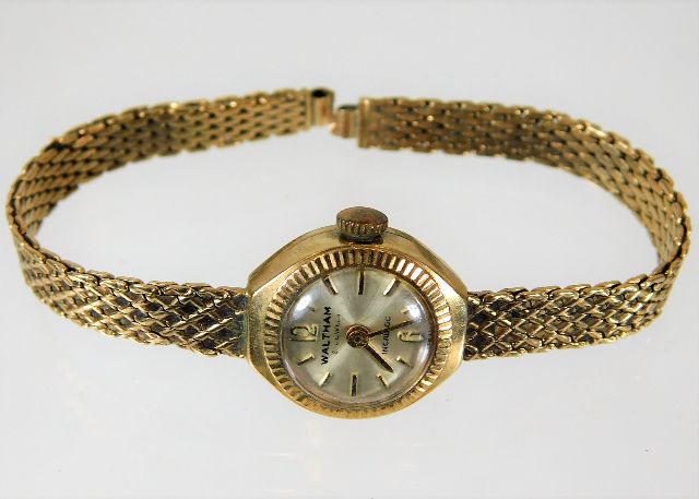 A ladies watch with 9ct gold case & strap a/f 11.3