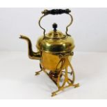 An art nouveau brass & copper spirit kettle & stan