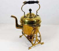 An art nouveau brass & copper spirit kettle & stan