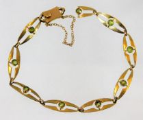 A vintage Liberty & Co. 9ct gold bracelet with per