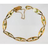 A vintage Liberty & Co. 9ct gold bracelet with per