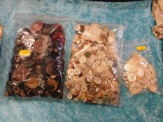Two bags of vintage buttons twinned with a bag of